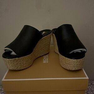 Michael Kors black wedges. They have been only worn once. Great for summer!